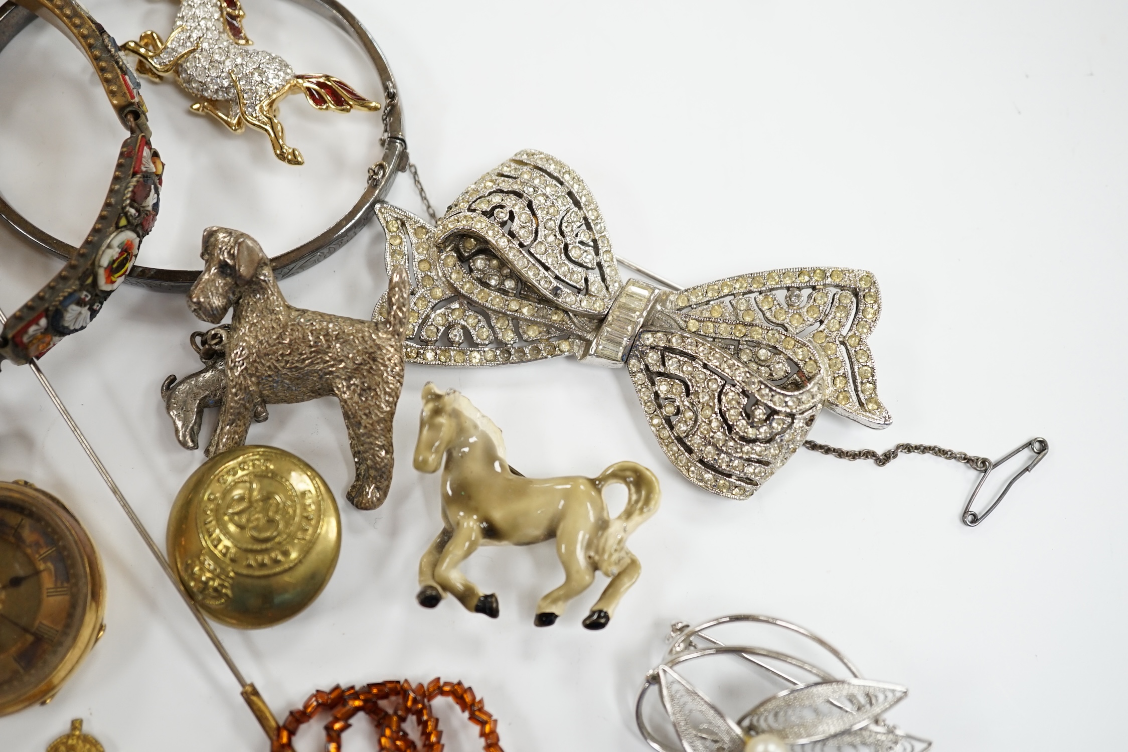 Two wrist watches, assorted badges and costume jewellery including paste set.